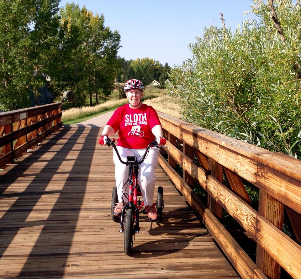A Liberty Trike rider enjoys her day outside.