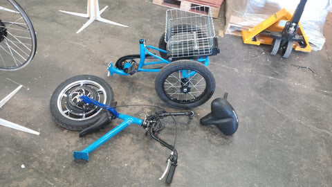 Take apart the Liberty Trike for easier transport.